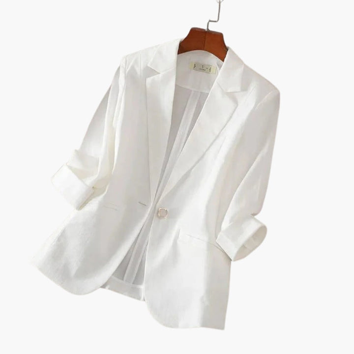 Front view of the Rosamund blazer in white showing tailored silhouette and notched lapels