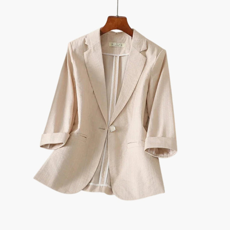Side view of the Rosamund beige blazer highlighting the 3/4 sleeve length and fitted cut