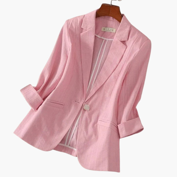Rosamund blazer styled over a blouse, shown in multiple color options including pink and beige