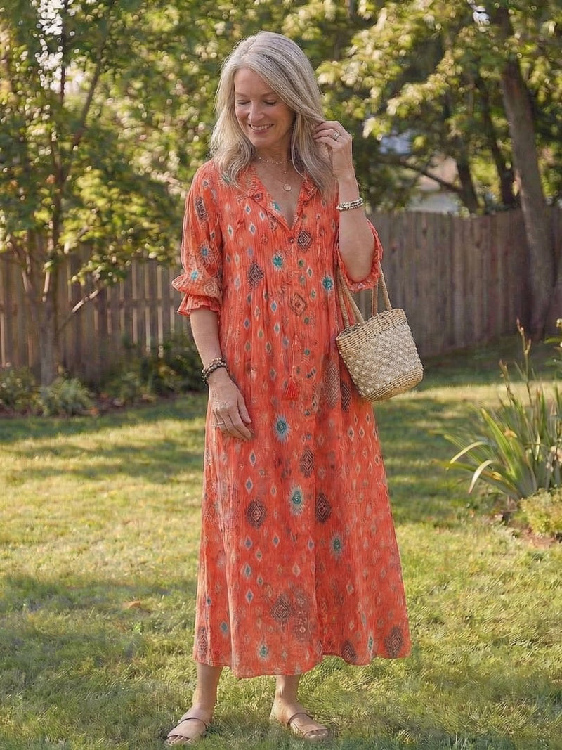 Roselyn floral maxi dress in light blue, front button detail and relaxed fit highlighted