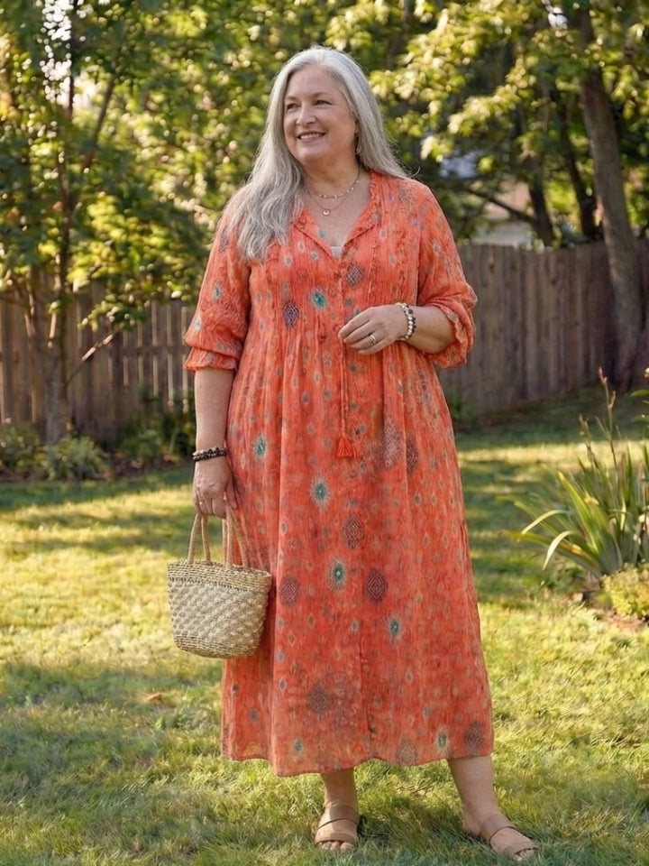 Roselyn floral maxi dress in yellow, worn with neutral sandals for a summer look