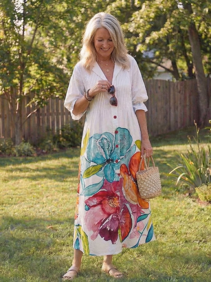 Roselyn floral maxi dress back view in multicolor print, showcasing 3/4 sleeve length