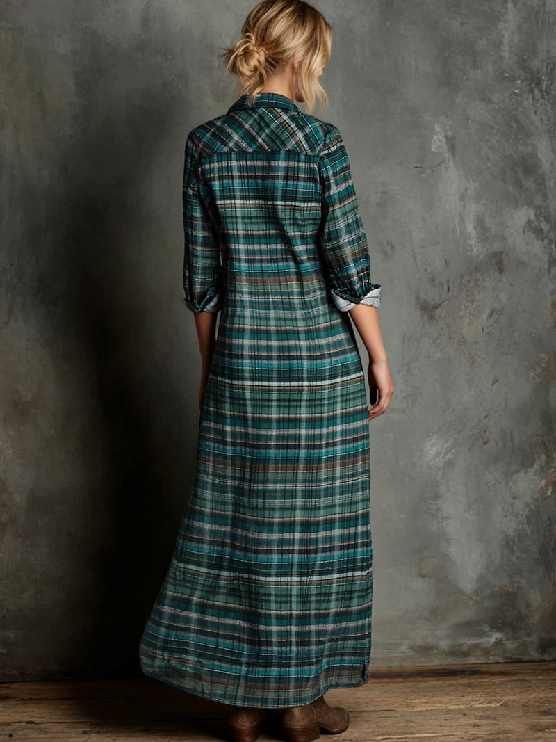Woman in the Rosemary black maxi dress styled with sandals for a casual daytime look