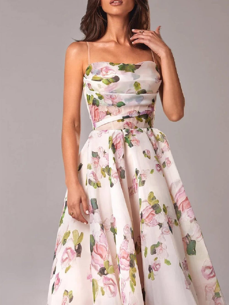 Back view of the Rosie spaghetti strap floral midi dress highlighting the open back and A-line silhouette