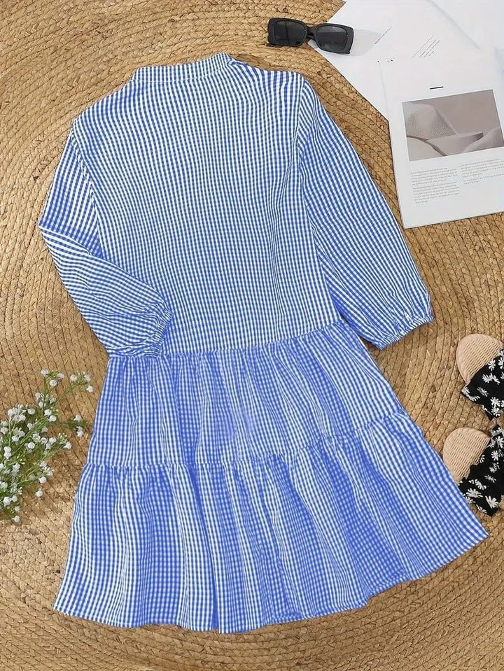 Full-length view of the Rosie gingham button-down mini dress in black