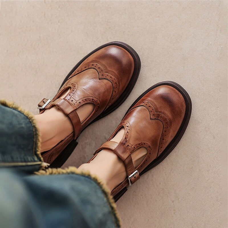 Rosie leather T-strap Mary Jane shoes in tan brown with brogue wingtip detailing and low block heel, front view