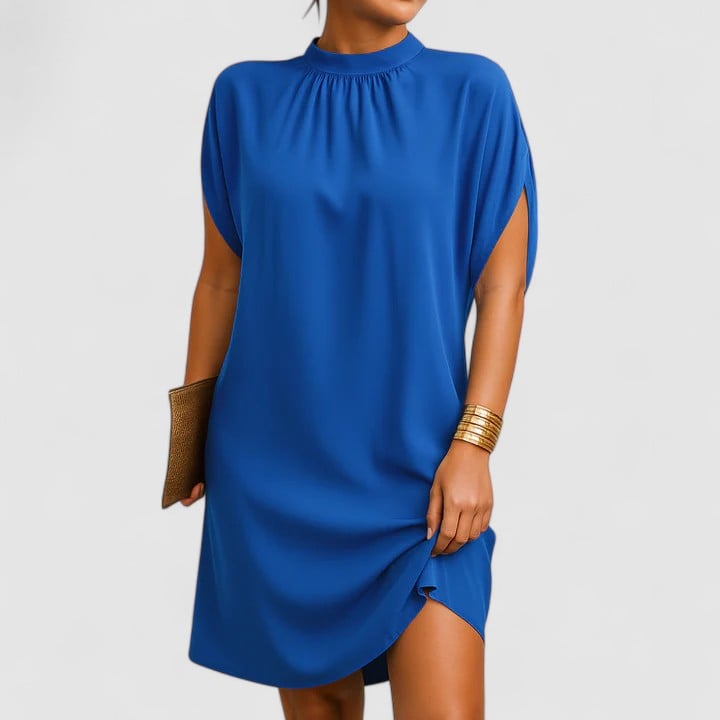 Close-up of the gathered mock neckline and split batwing sleeve detail on the Rosie midi dress