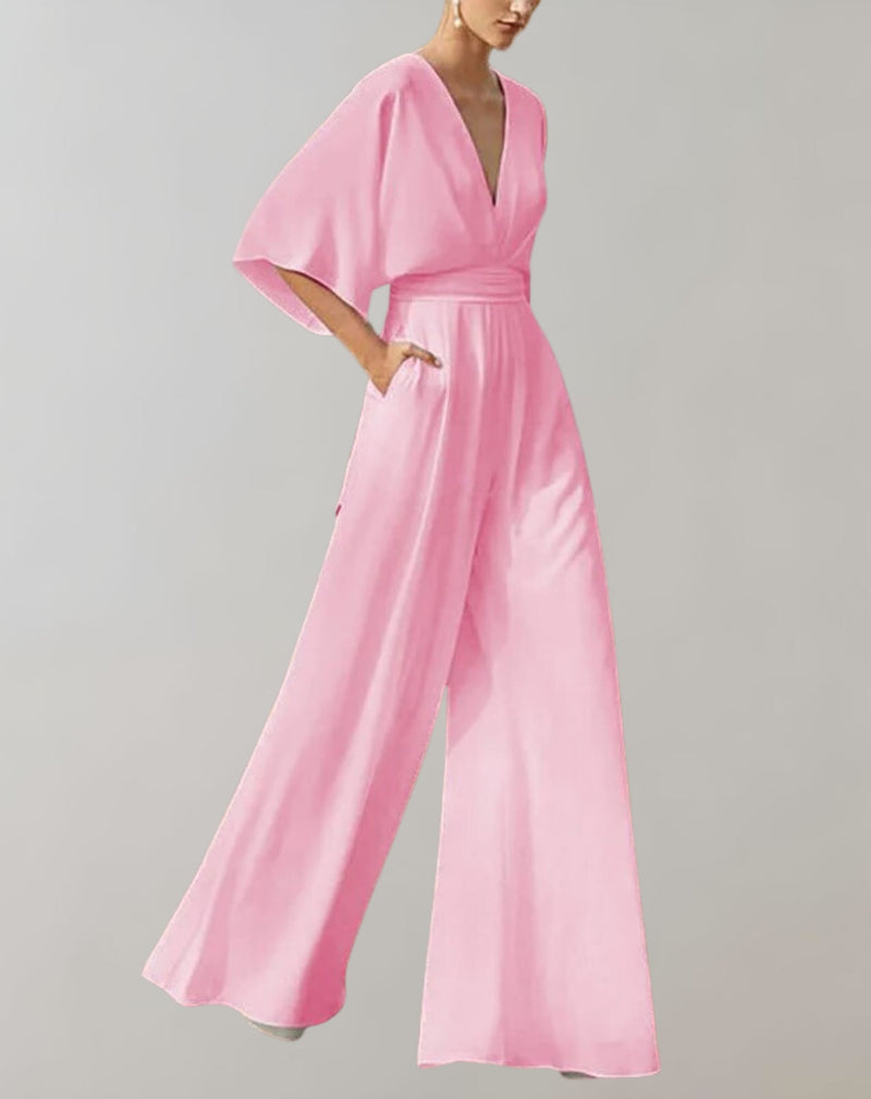 Rosie wide-leg jumpsuit in blush pink showing flowing batwing sleeves and floor-length trousers