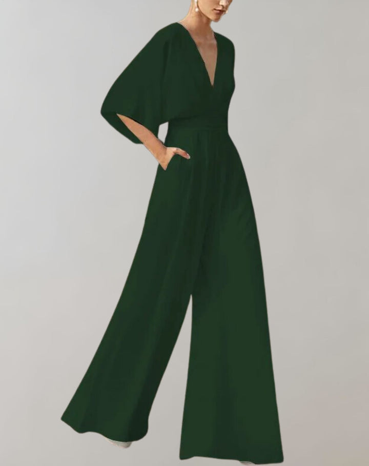 Women's formal wide-leg jumpsuit in white with batwing sleeves and plunging V-neckline