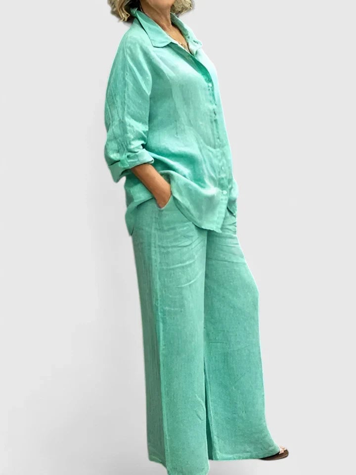 Side view of Roslyn wide-leg linen pants with deep side pockets in pink