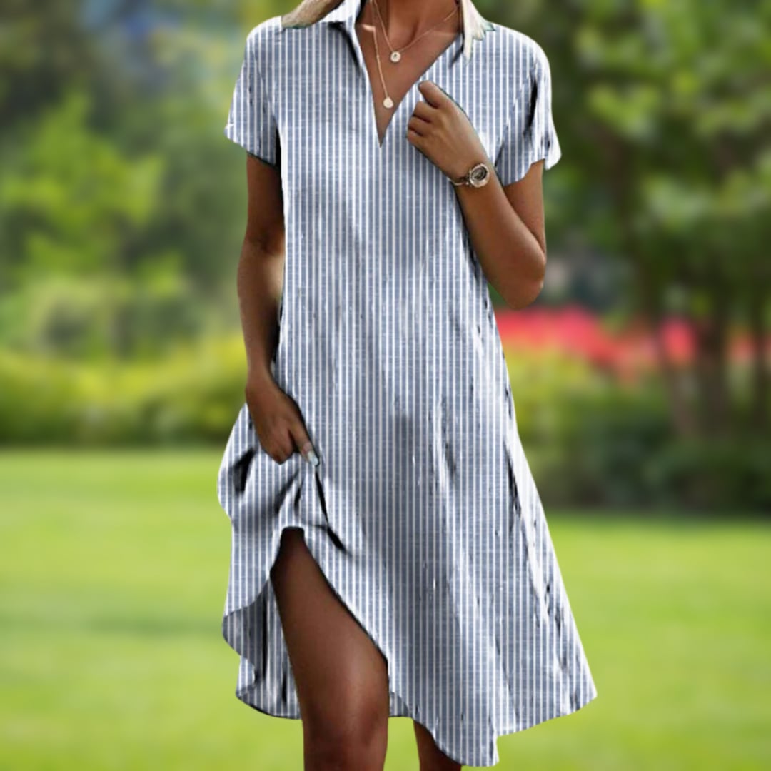 Rowan elegant cocktail dress in white styled for a special occasion with a polished sophisticated look