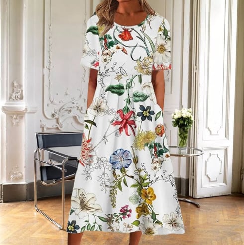 Front view of the Ruby floral midi dress in red flower print, styled with sandals for a summer look