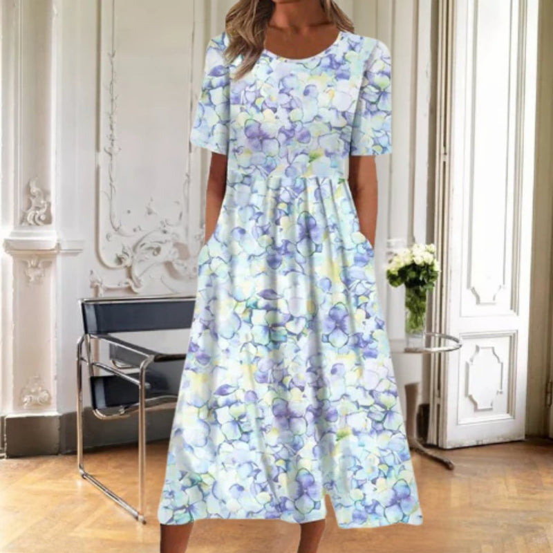 Side view of the Ruby floral midi dress highlighting the flowing A-line cut and relaxed feminine fit