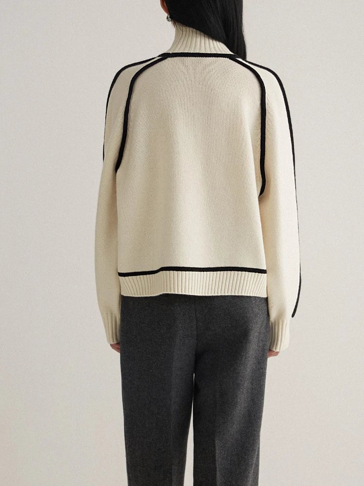 Ruby sweater in gray displayed to show its versatile, timeless style