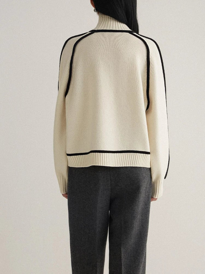Ruby sweater in gray displayed to show its versatile, timeless style