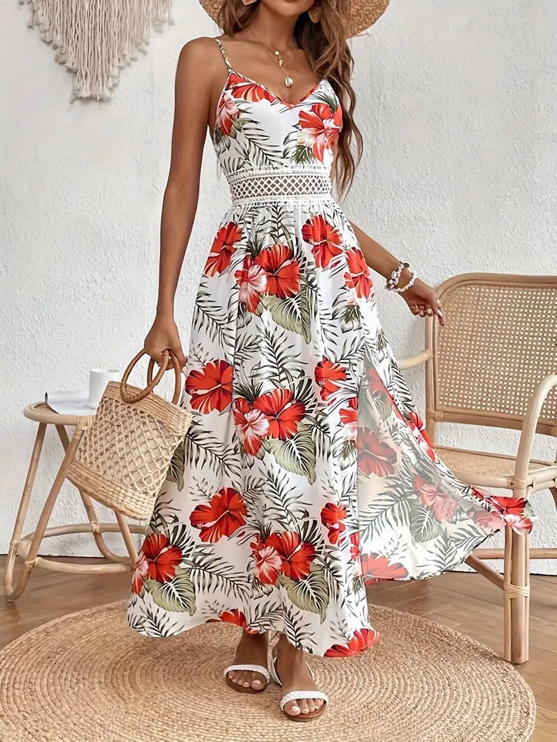 Front view of the Ruby floral midi dress in blue, highlighting the graceful fit and feminine midi length
