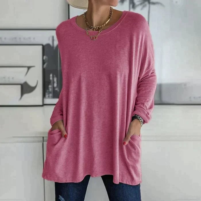 Front view of the Ruby tunic top in black showing the crew neckline and hip-length hem