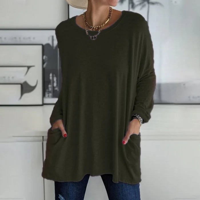 Ruby long sleeve tunic top in cyan showcasing the hip-length hem and relaxed fit