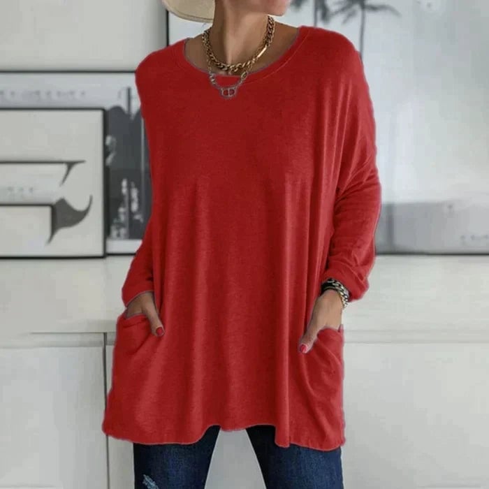 Flat lay of the Ruby oversized tunic top showing the full silhouette and sleeve detail