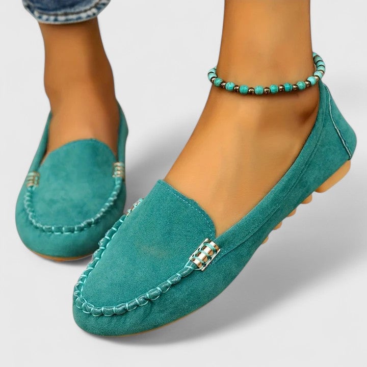 Ruby suede loafers in black with moccasin stitch detail, front view