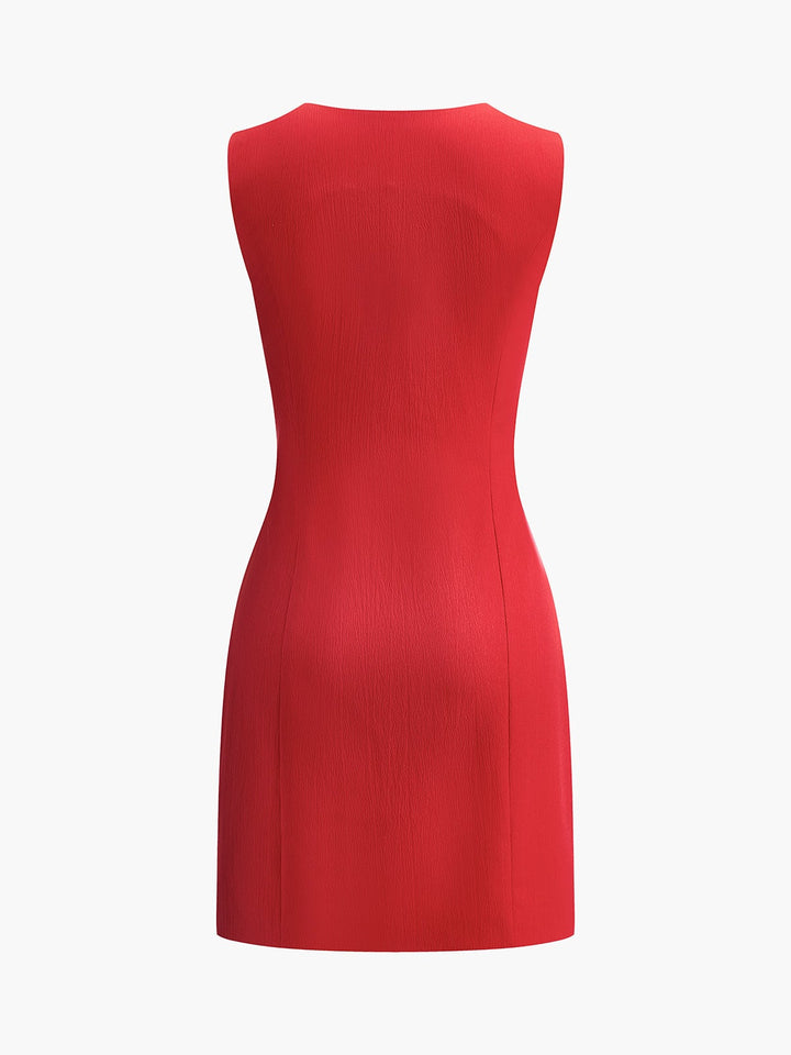 Side profile of the black mini dress highlighting the structured bodice fit