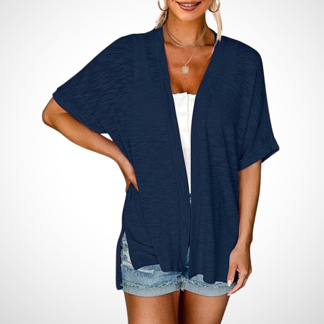 Side view of flowy short sleeve cardigan showing relaxed silhouette and graceful hemline