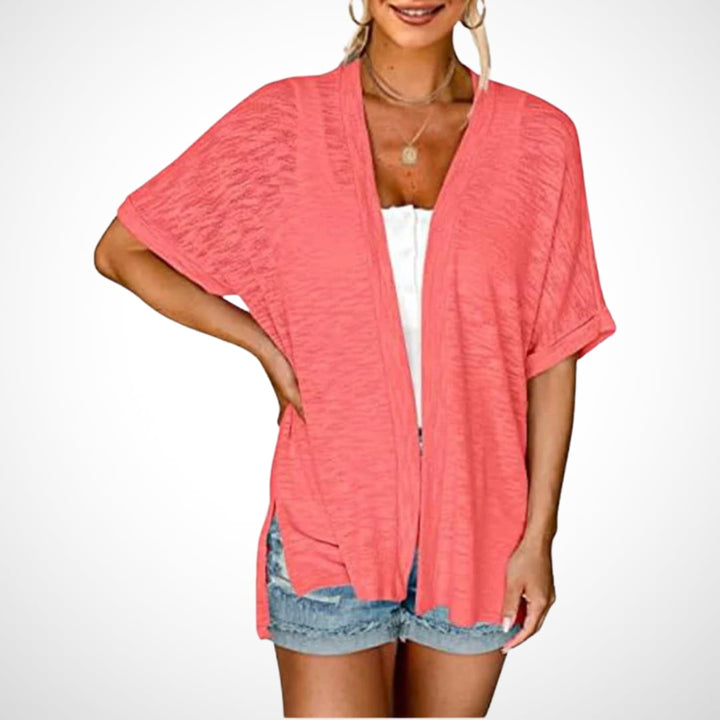 Detail shot of the open-front neckline and short sleeve of the lightweight cardigan