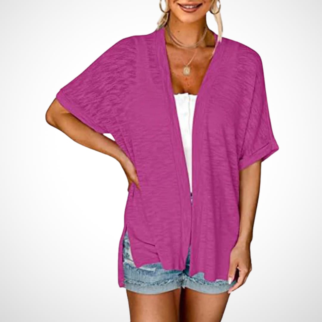 Flowy short sleeve cardigan in lavender purple styled with white shorts for a summer outfit