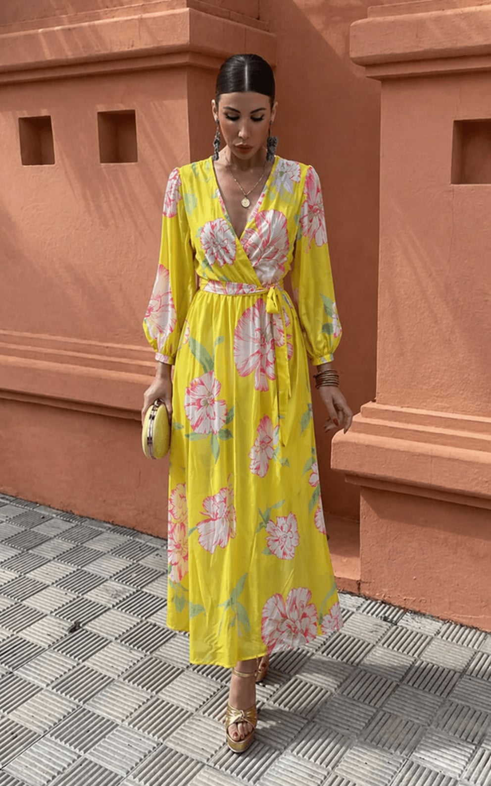 Full-length view of the Sabine floral dress in yellow, showing relaxed silhouette and airy summer styling