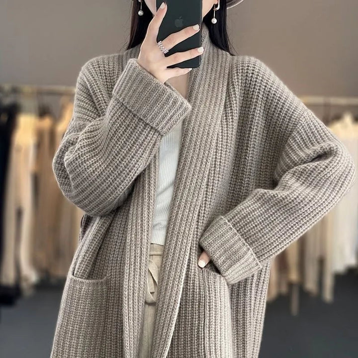 Close-up detail of the delicate open-knit texture on the Sadie cardigan in beige