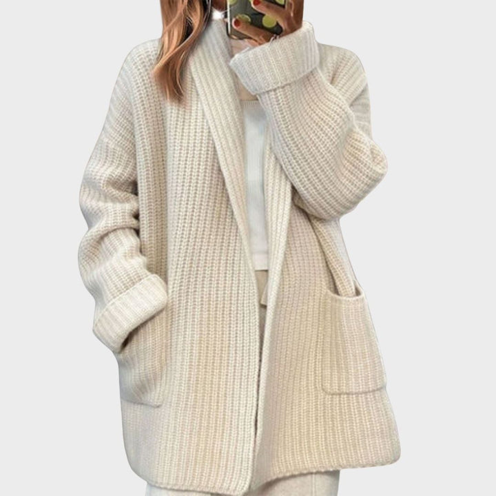 Model styling the Sadie cardigan over a white tee and jeans for an everyday casual look
