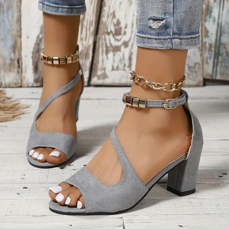 Sadie sandals in beige, black, and gray lined up together showing color options