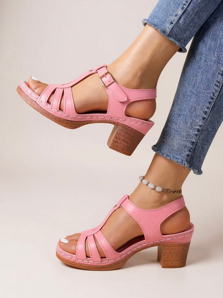 Saffron women's block heel sandal in a neutral colorway, front three-quarter view showing cushioned insole and sturdy heel