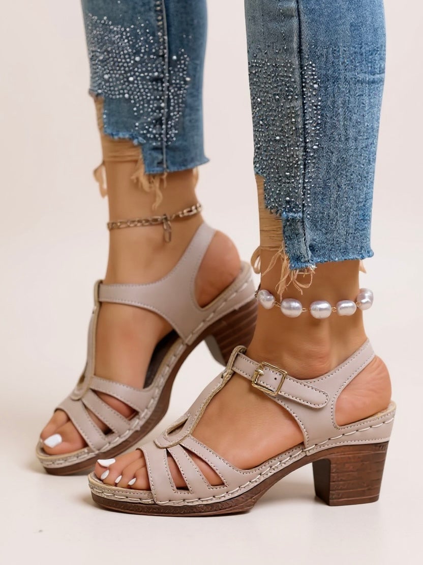 Saffron sandal in Navy Blue on a flat surface, side view showing breathable upper material