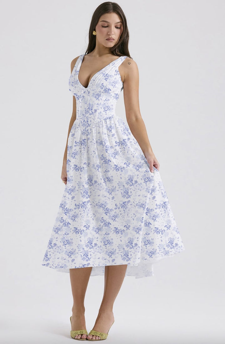 Side profile of the Saffron blue floral dress highlighting the airy, lightweight fabric and hip-skimming fit
