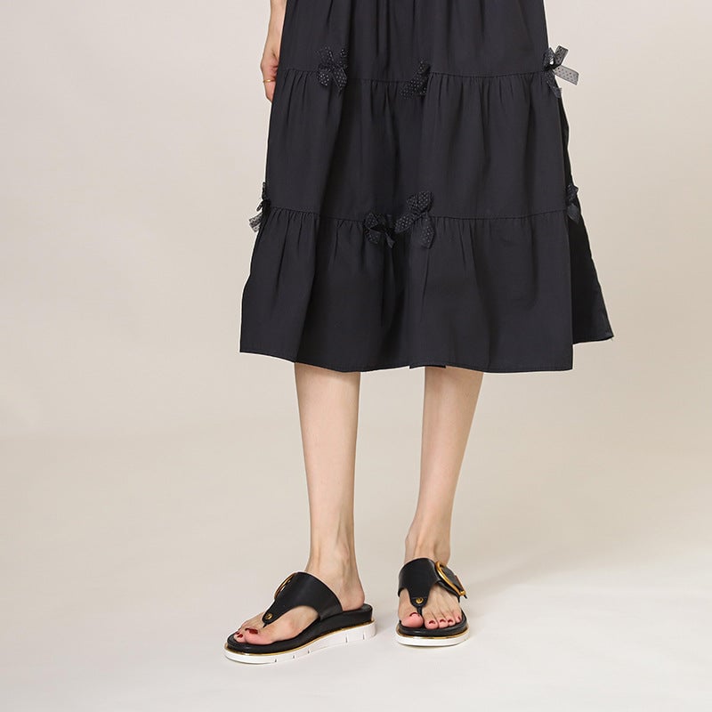 Sage women's sandals flat lay showing all three color options: off-white, dark blue, and black