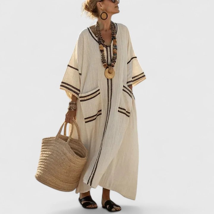 Striped linen maxi dress with 3/4 sleeves and contrast teal cuffs — side view