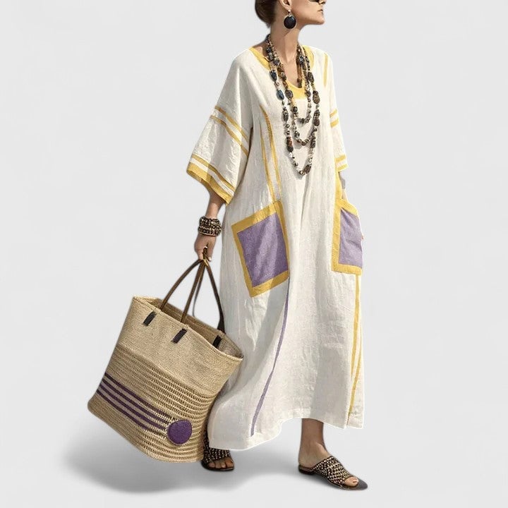 Striped linen maxi dress shown in gray colorway — front view