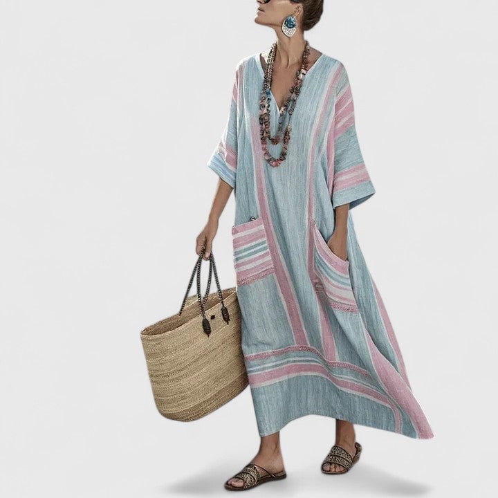 Size chart detail and fabric texture close-up of striped linen maxi dress