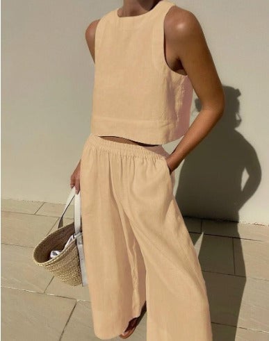 Salina two-piece set in green, model styled with sandals, front view