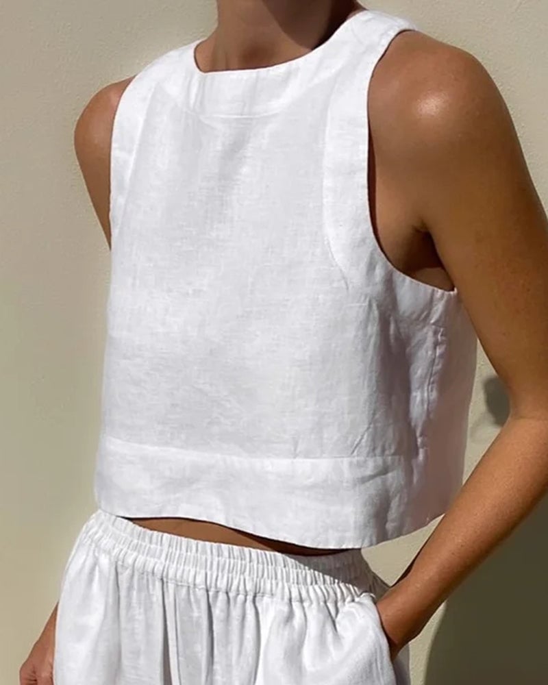 Flat lay of Salina two-piece set showing crop top and wide-leg pants in beige