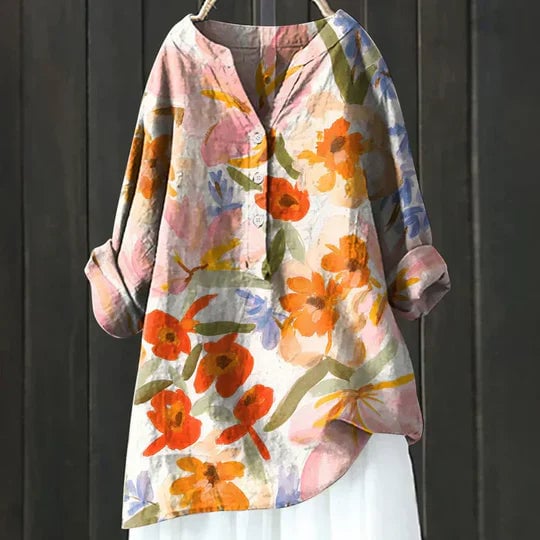 Front view of the Sally relaxed top in orange showing the loose, flattering cut and lightweight fabric
