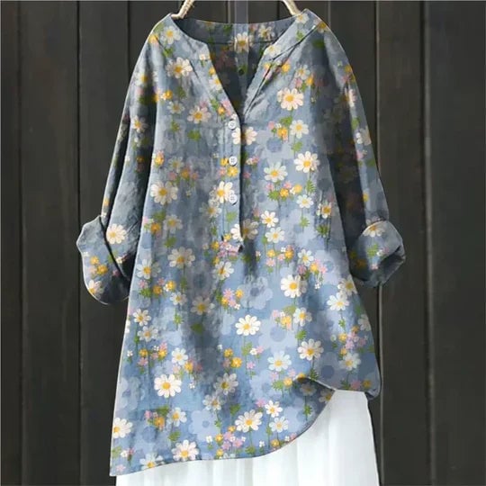 Close-up detail of the airy fabric and minimal design of the Sally summer top in blue