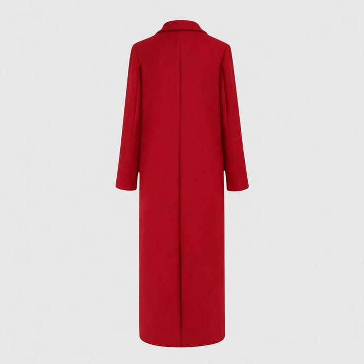 Full-length shot of model in longline winter trench coat styled for evening occasion