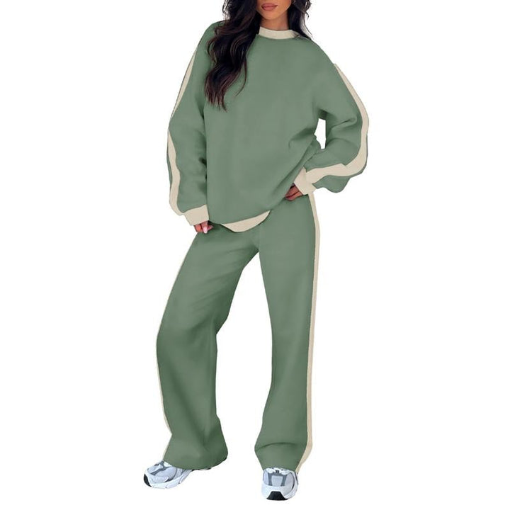 Flat lay of the Samara sweatshirt set in green displaying the top and pants as a coordinated set
