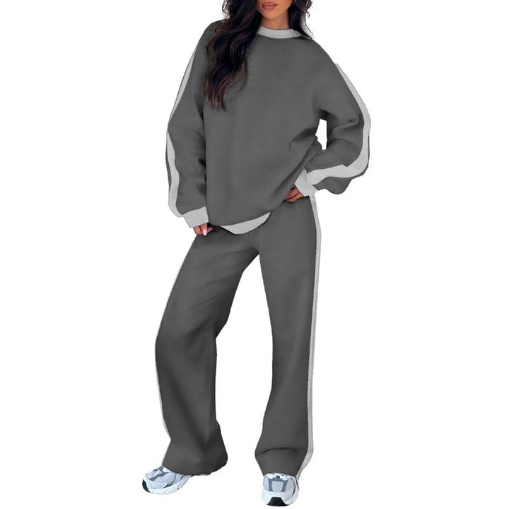 Model wearing the Samara sweatshirt set in white, styled for a clean and polished lounge look