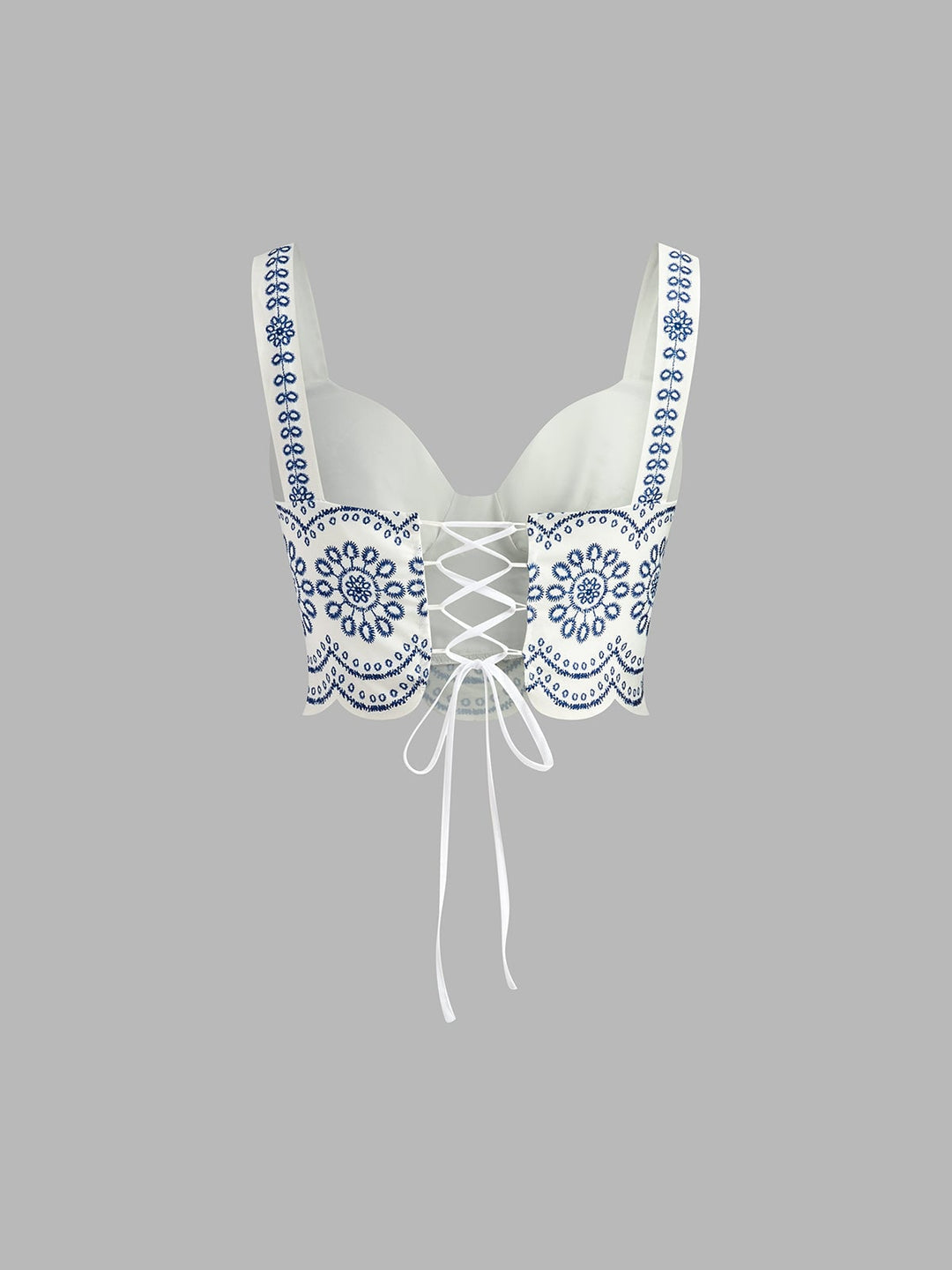Back view of the crop top showing delicate tie-back closure detail