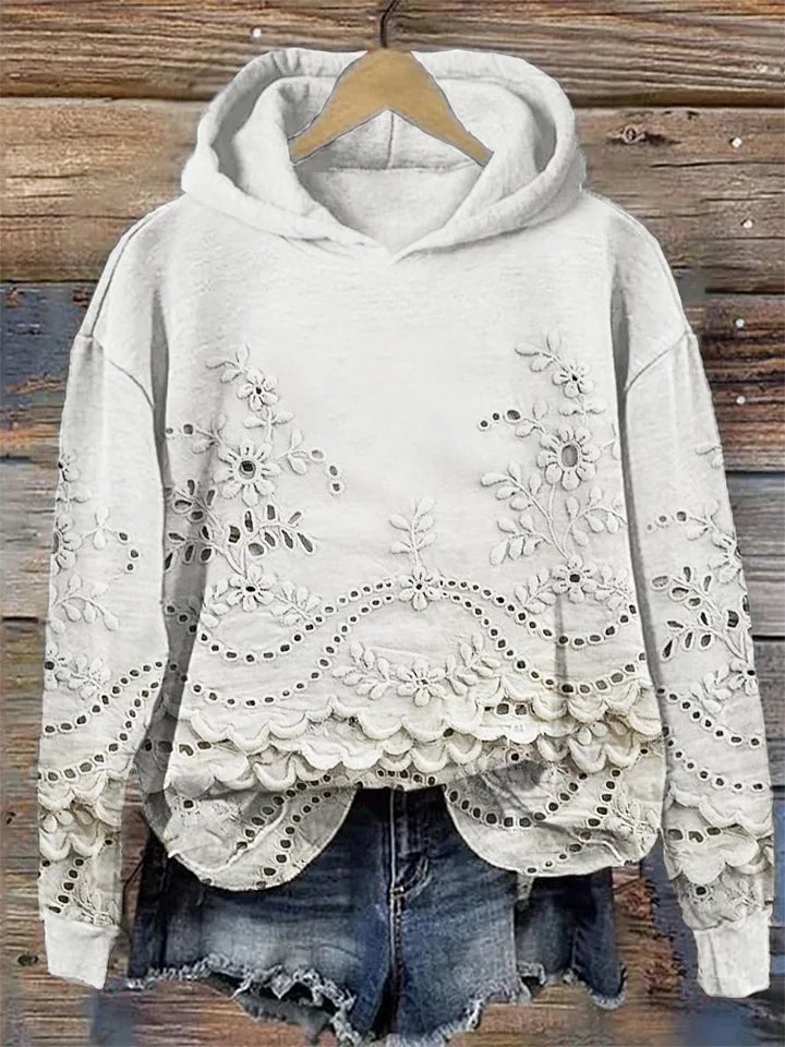 Side view of a cozy floral embroidered pullover hoodie