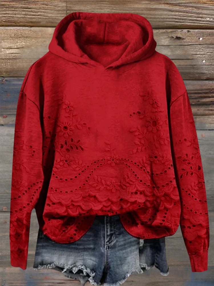 Lifestyle shot of a woman in a soft floral hoodie for everyday wear