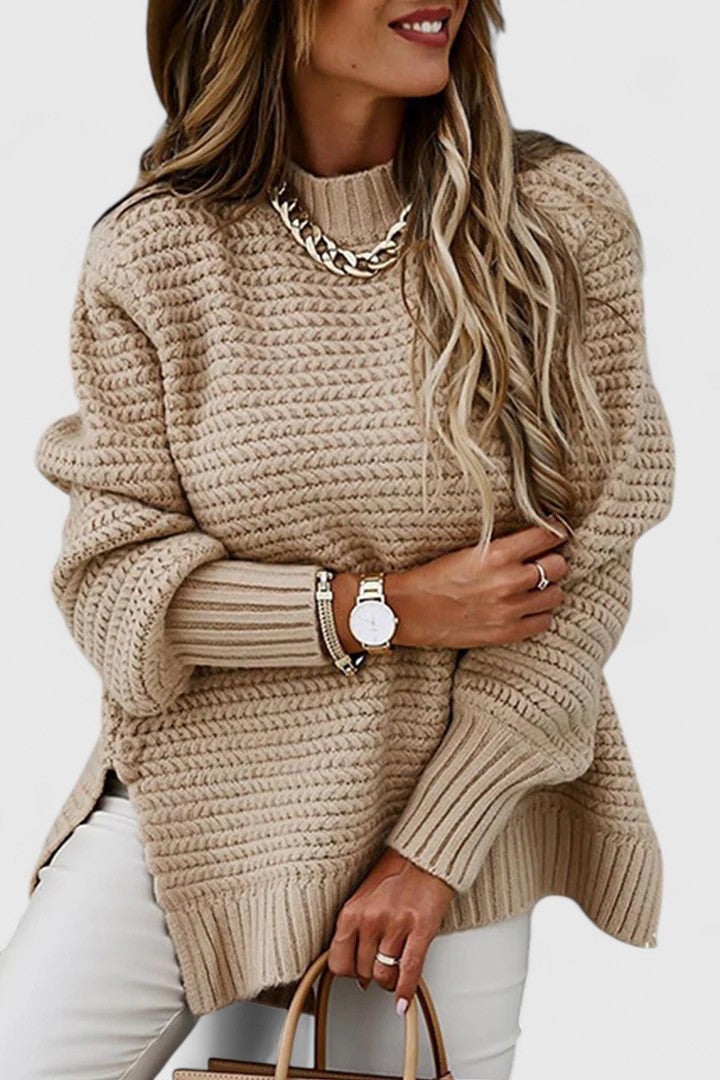Savannah sweater in a warm apricot colorway, draped naturally over the figure